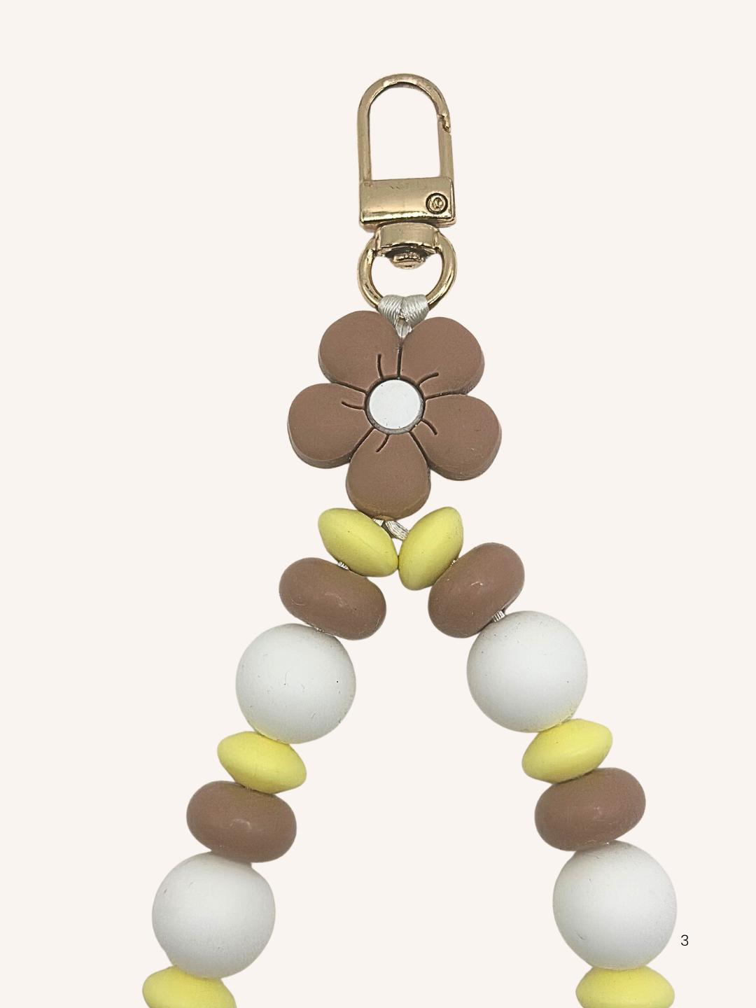 Chaine de téléphone fleur brune & perles jaune beurre