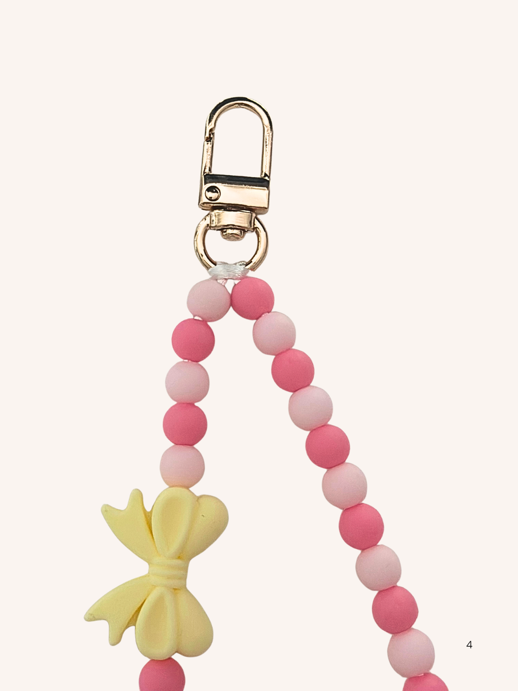 Chaine de téléphone nœud jaune & rose