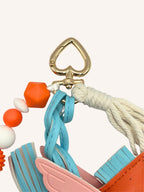 Bijou de sac cheval orange