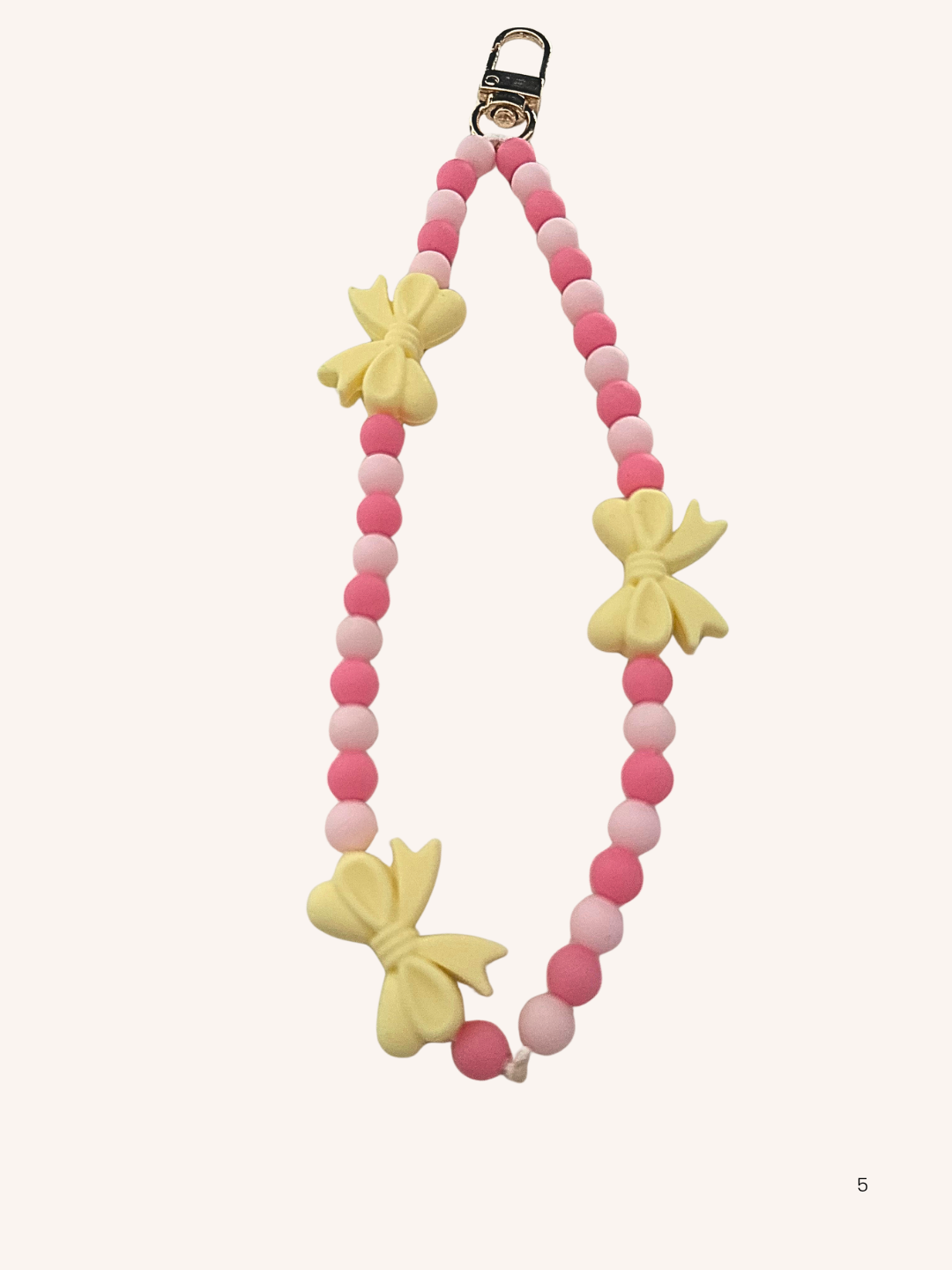 Chaine de téléphone nœud jaune & rose