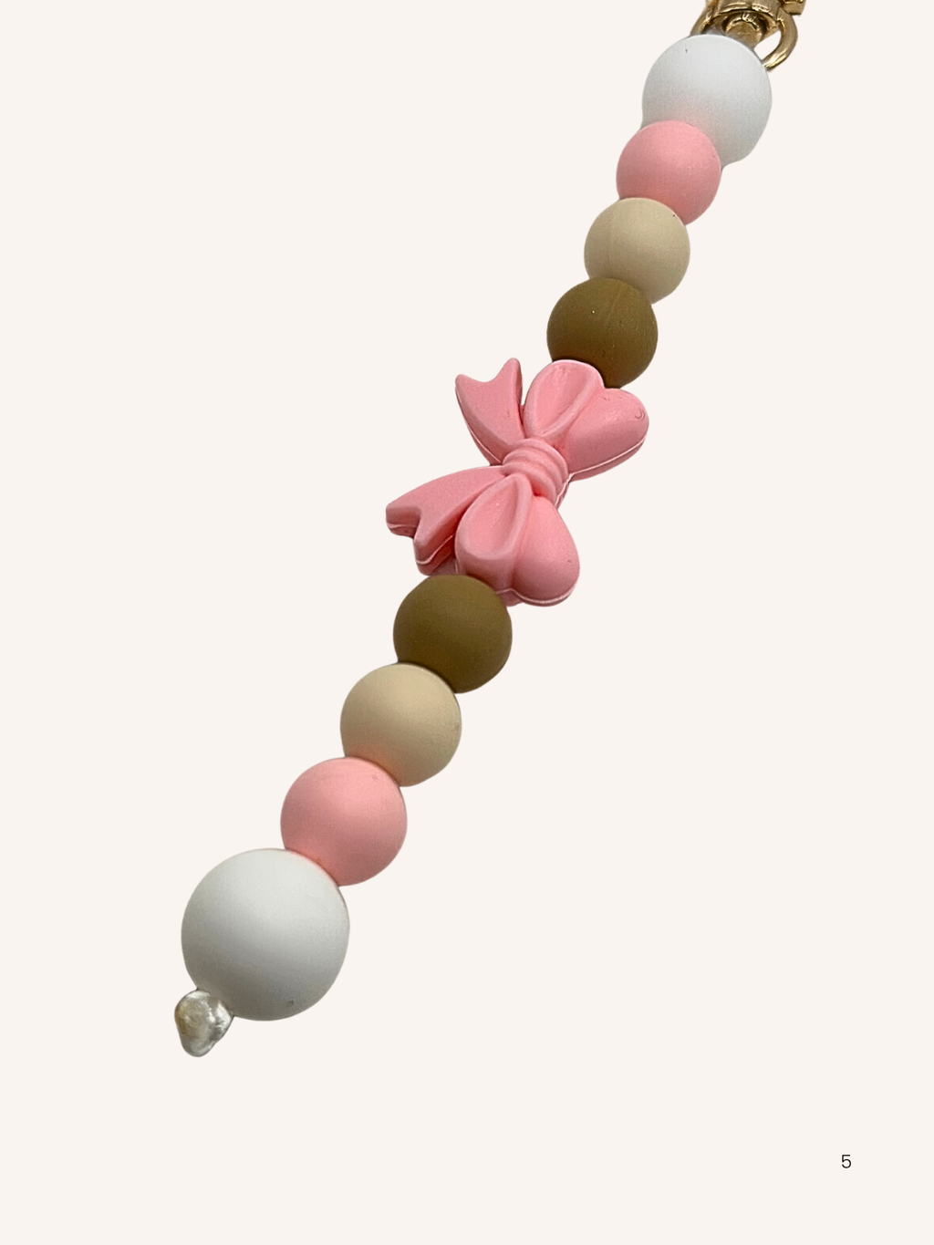 Chaîne de téléphone nœud papillon rose