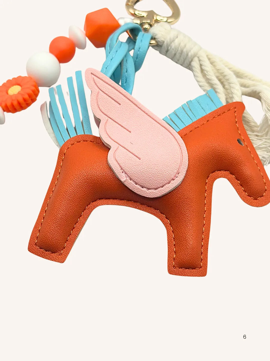 Bijou de sac cheval orange