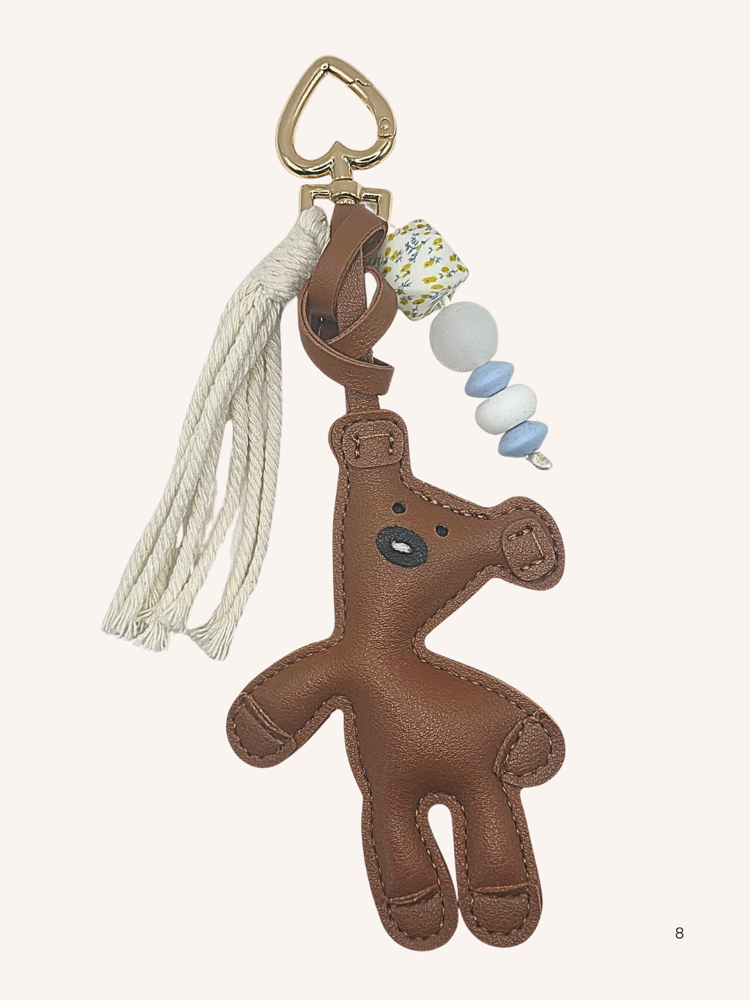 Bijou de sac Nounours brun et fleurs bleues