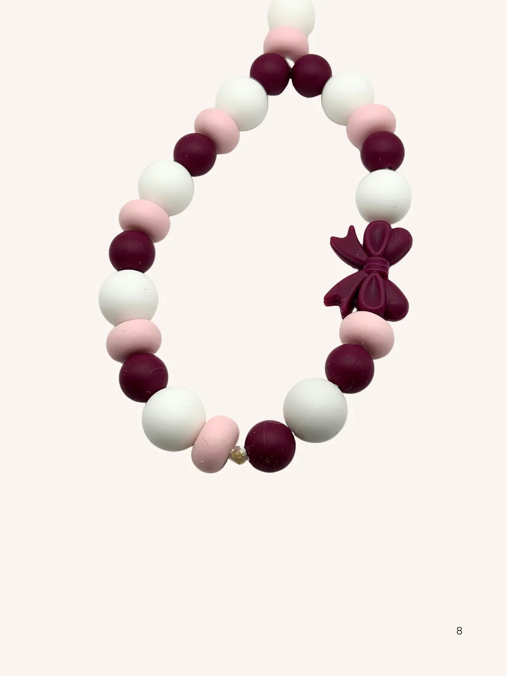 Chaine de téléphone noeud rose